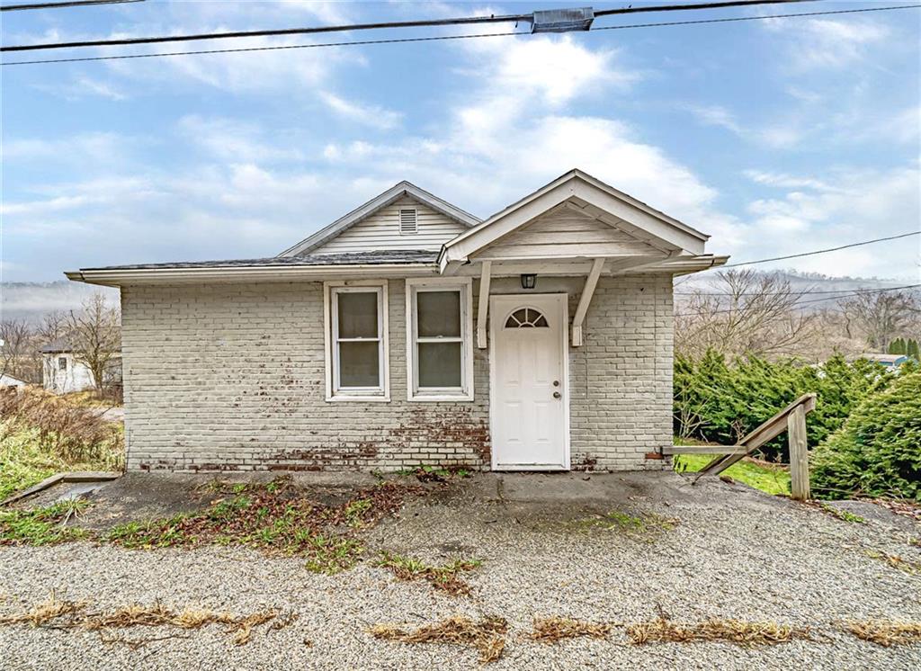 980 Crucible Road Rices Landing, PA 15357 - Photo 24 of 24 a view of a house with a yard and garage
