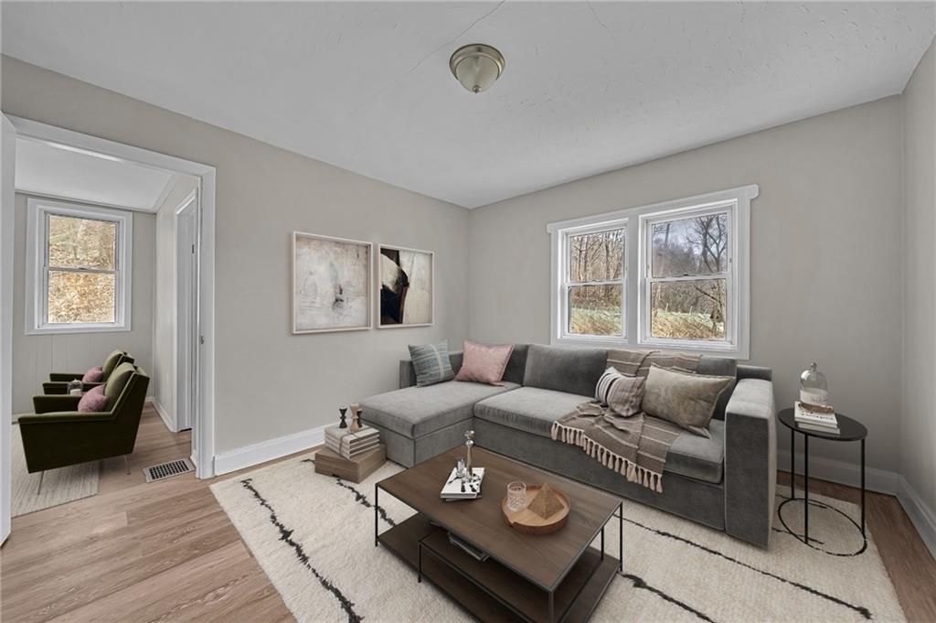 980 Crucible Road Rices Landing, PA 15357 - Photo 4 of 24 a living room with furniture and a window