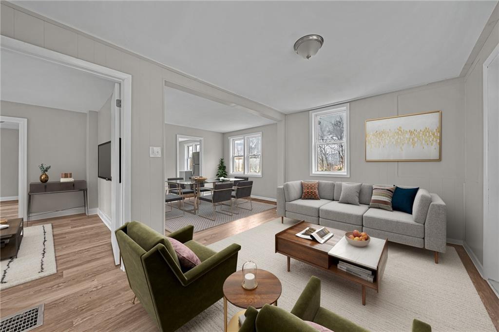 980 Crucible Road Rices Landing, PA 15357 - Photo 6 of 24 a living room with furniture or couch and a wooden floor