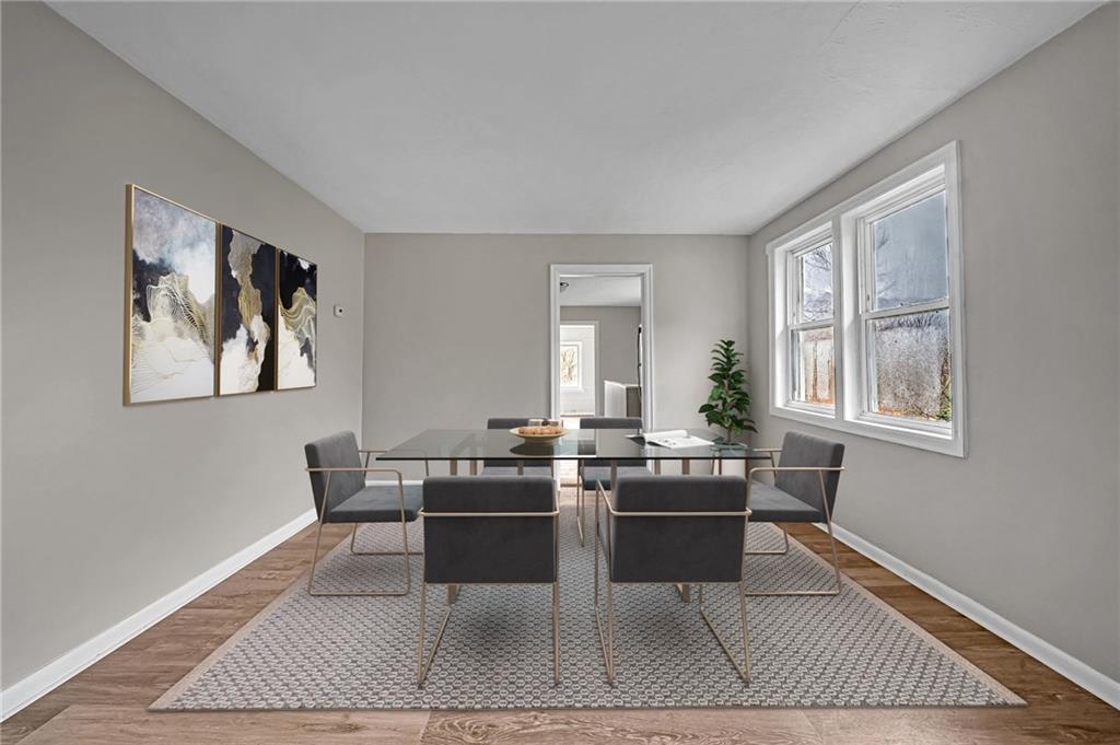 980 Crucible Road Rices Landing, PA 15357 - Photo 8 of 24 a living room with lots of furniture and window