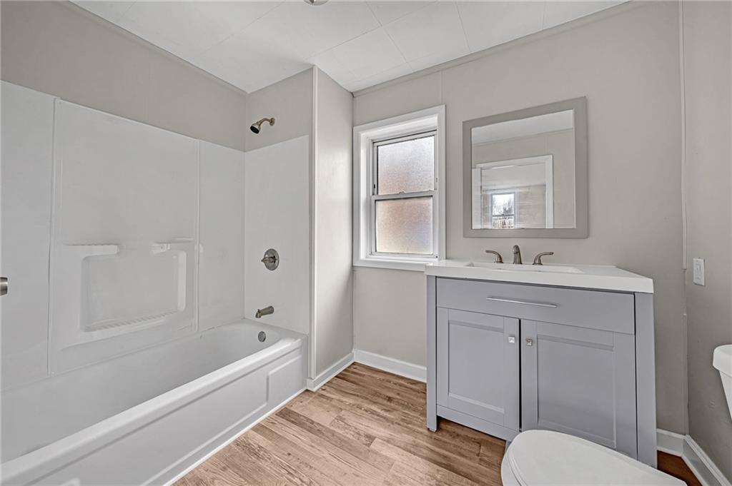 980 Crucible Road Rices Landing, PA 15357 - Photo 10 of 24 a bathroom with a tub toilet sink and mirror