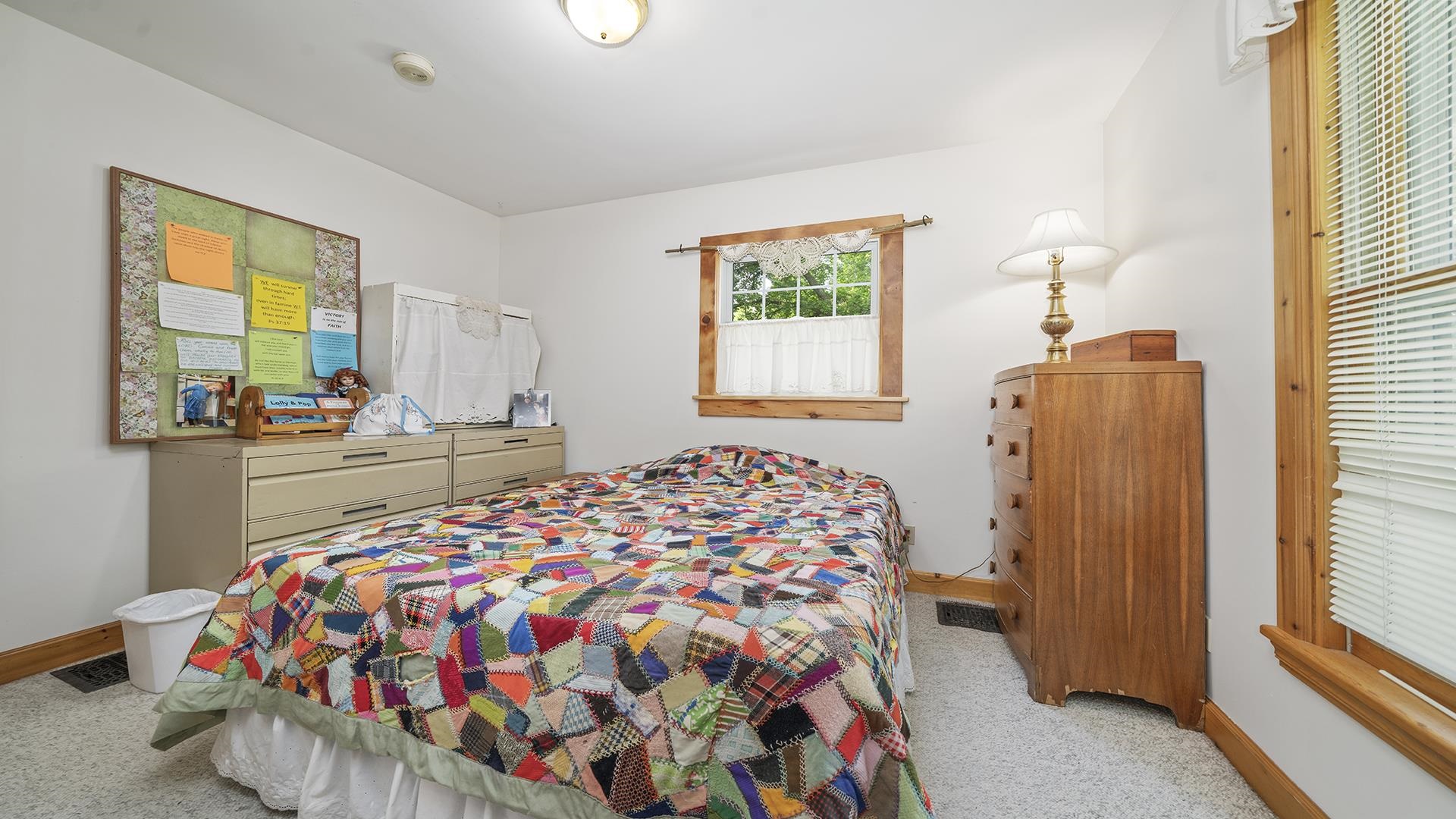 13524 White School Road Roscoe, IL 61073 - Photo 12 of 23 a bedroom with a bed and a window