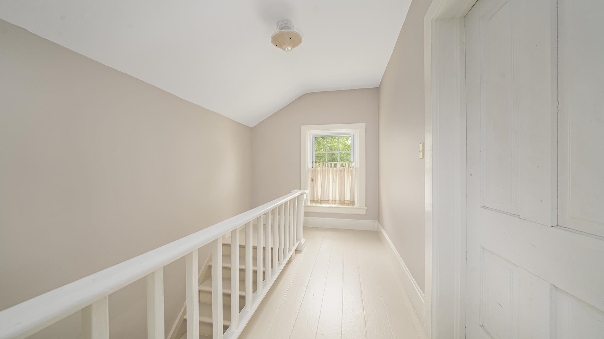 13524 White School Road Roscoe, IL 61073 - Photo 14 of 23 a view of hallway with windows
