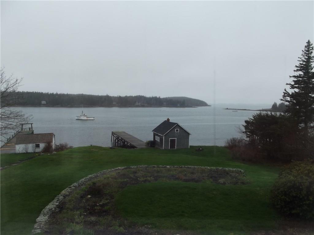 180 Horse Point Road St. George, ME 04860 - Photo 2 of 23 view from back of the house on rainy day
