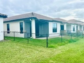 a house with garden in front of it