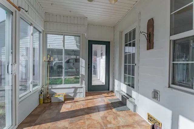 a bathroom with a bathtub and a sink