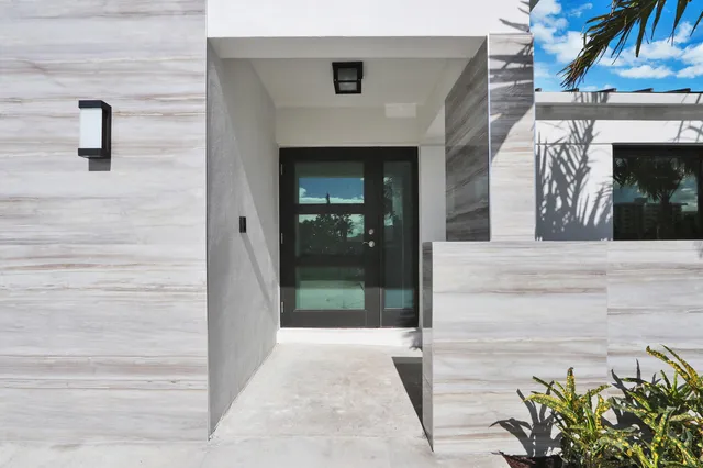 a kitchen with a table and chairs in it