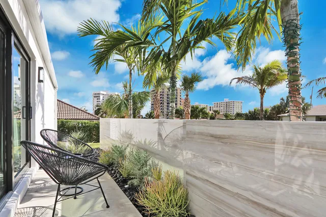 a kitchen with a table and chairs in it