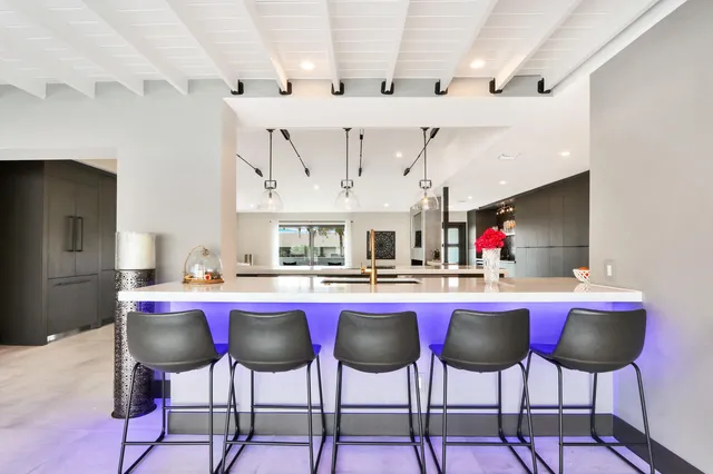 a bathroom with a sink vanity and a mirror