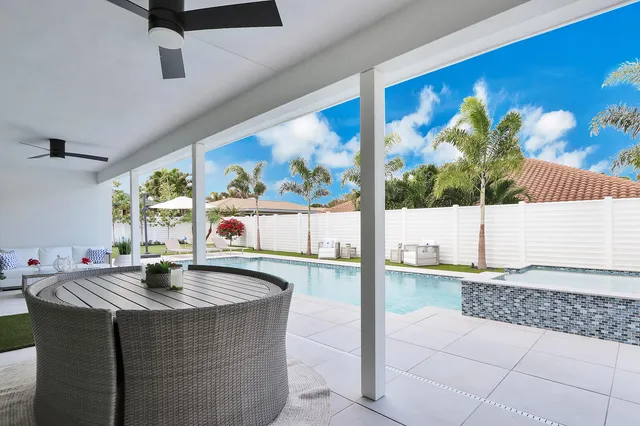 an aerial view of a house with a garden and plants