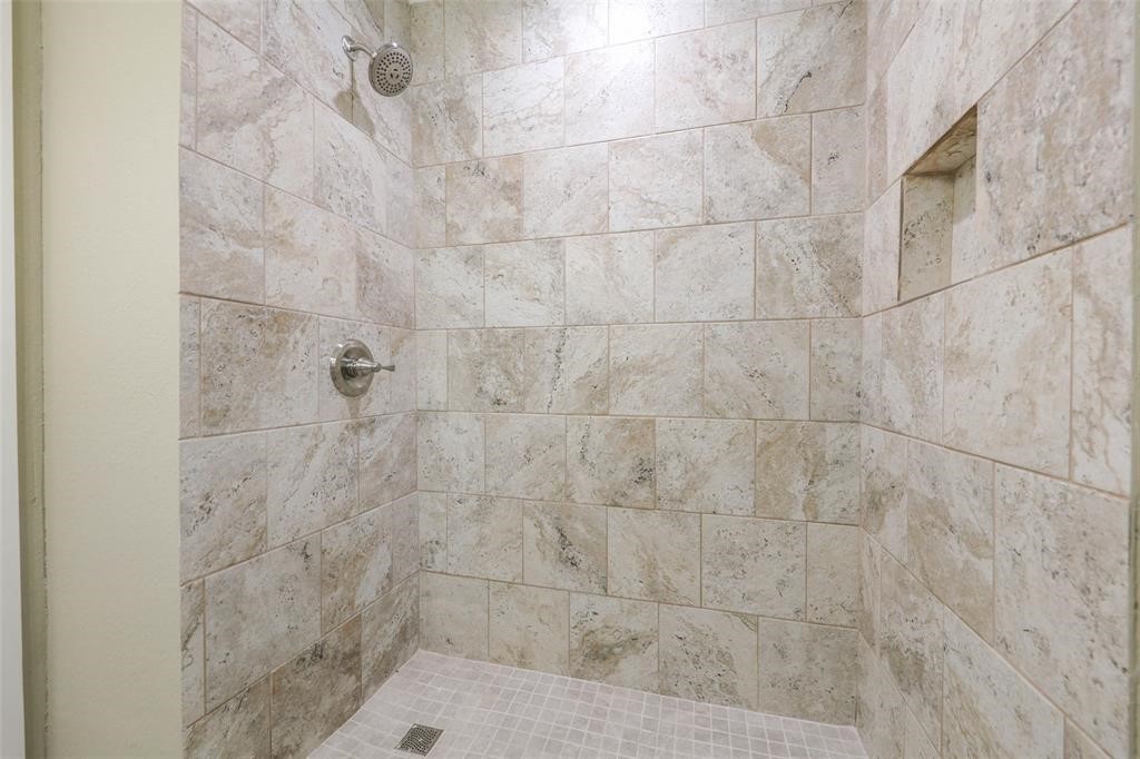 4139 Lumberdale Road Houston, TX 77092 - Photo 22 of 31 a bathroom with a shower