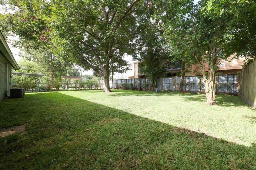 4139 Lumberdale Road Houston, TX 77092 - Photo 30 of 31 a view of a house with a yard