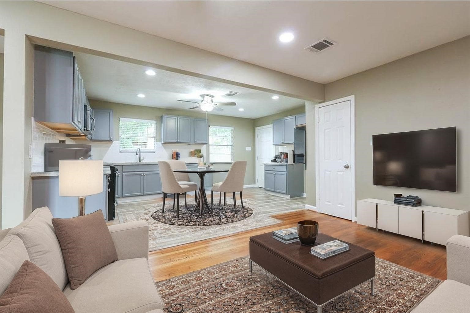 4139 Lumberdale Road Houston, TX 77092 - Photo 3 of 31 a living room with furniture and a flat screen tv