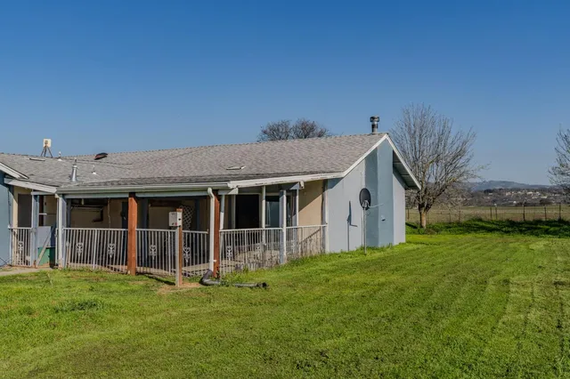a house view with a garden space