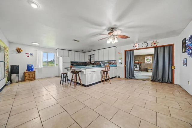 a kitchen with a sink a counter top space and appliances