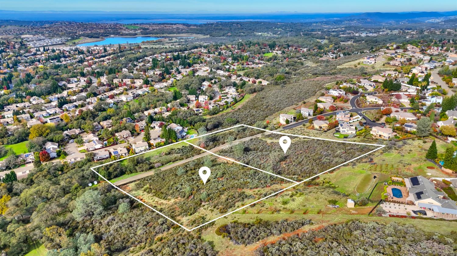 0 Rancho Tierra Court Cameron Park, CA 95682 - Photo 11 of 15 an aerial view of residential houses with outdoor space