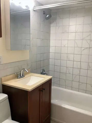 a bathroom with a sink and a bathtub