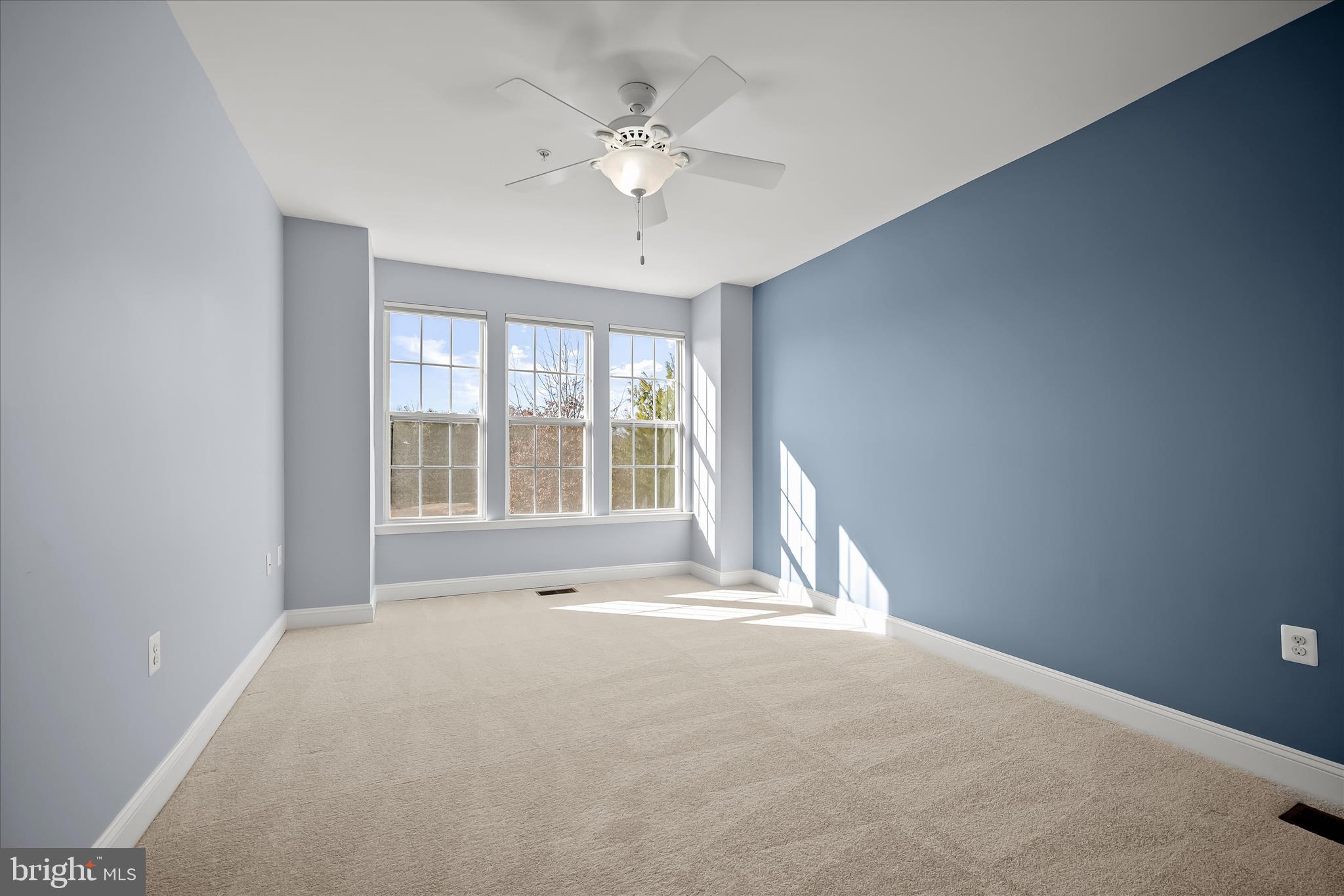 11246-1 Chase Street, Unit 141 Fulton, MD 20759 - Photo 26 of 38 a view of an empty room with a window