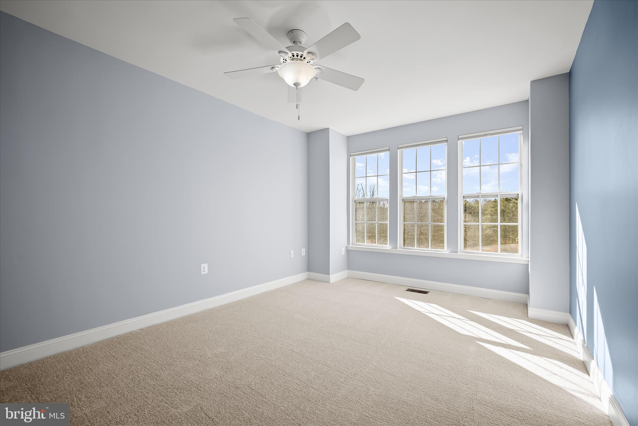 11246-1 Chase Street, Unit 141 Fulton, MD 20759 - Photo 27 of 38 a view of an empty room with a window