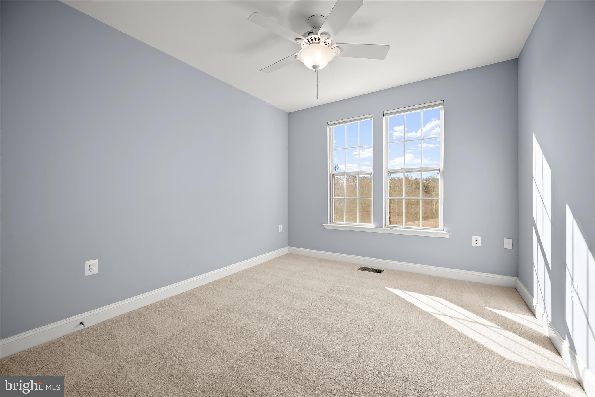 11246-1 Chase Street, Unit 141 Fulton, MD 20759 - Photo 33 of 38 a view of an empty room with a window