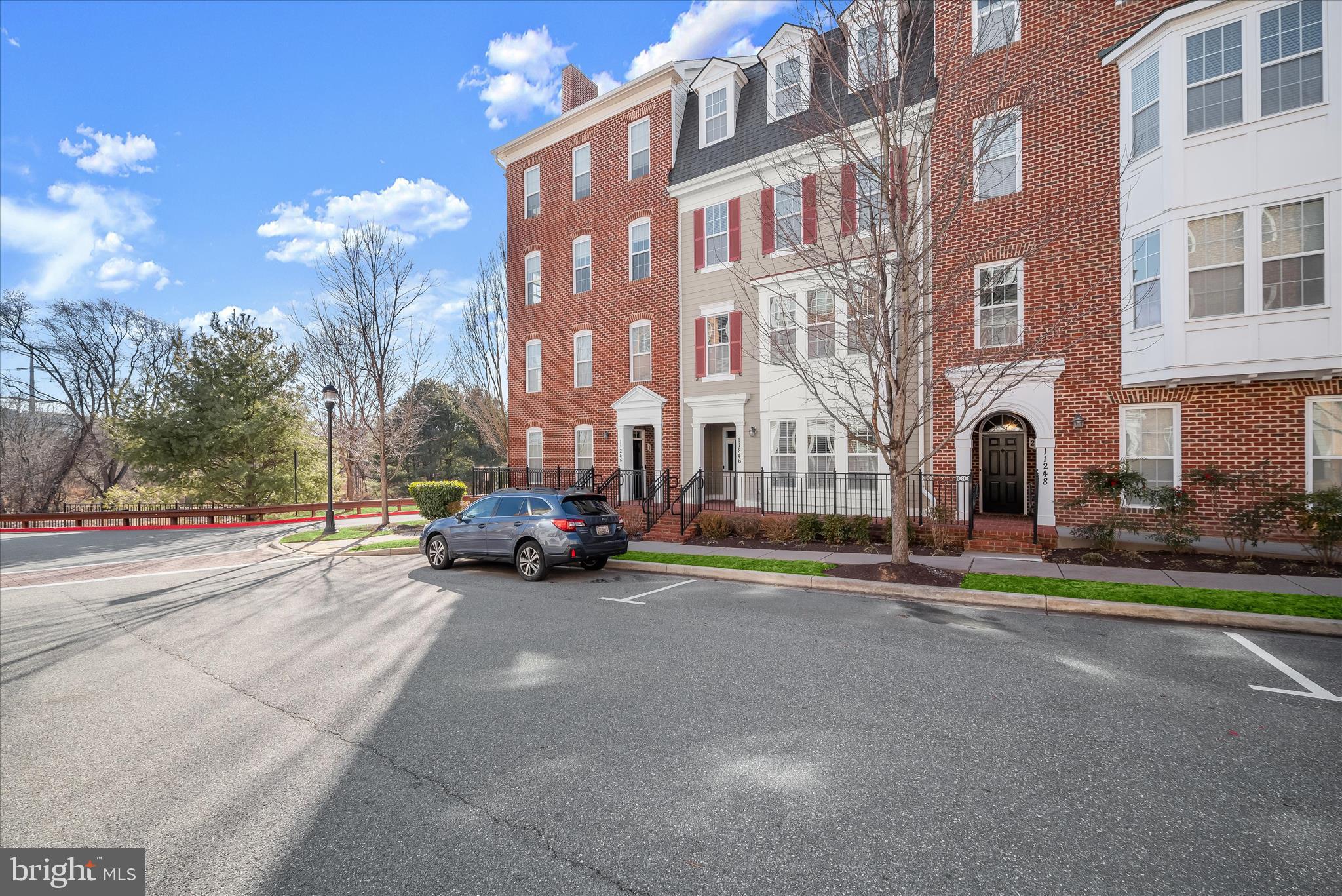 11246-1 Chase Street, Unit 141 Fulton, MD 20759 - Photo 38 of 38 a view of a parked cars in front of a building