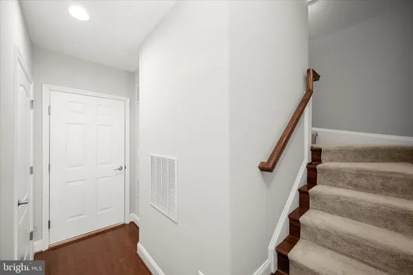 a view of entryway with stairs