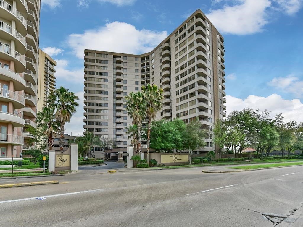 3525 Sage Road, Unit 704 Houston, TX 77056 - Photo 3 of 29 a view of a tall building next to a road