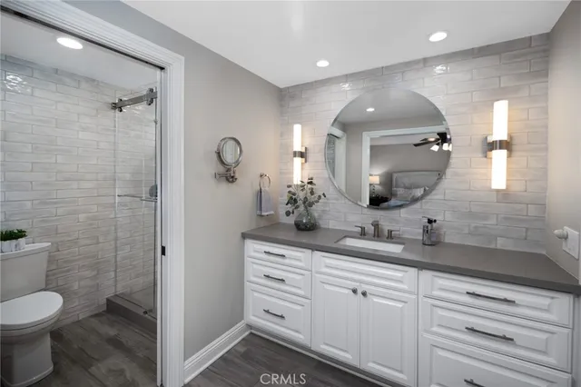 a bed room with a bed and a dresser