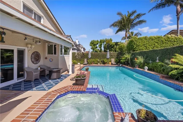 a view of a house with backyard porch and patio