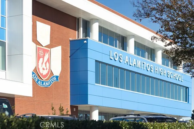 a street sign on a pole on a street