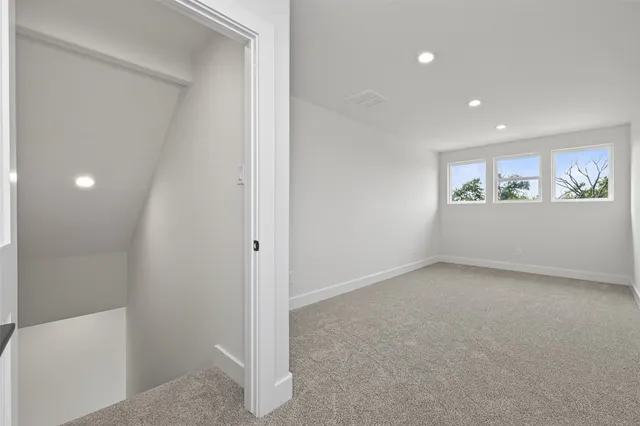 a view of an empty walk in closet