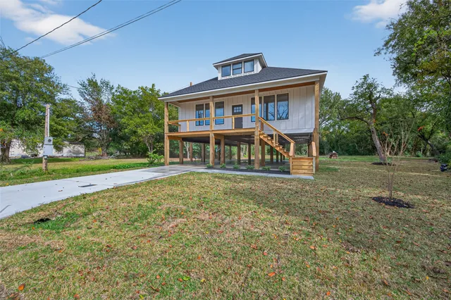 a view of an empty room with a large window