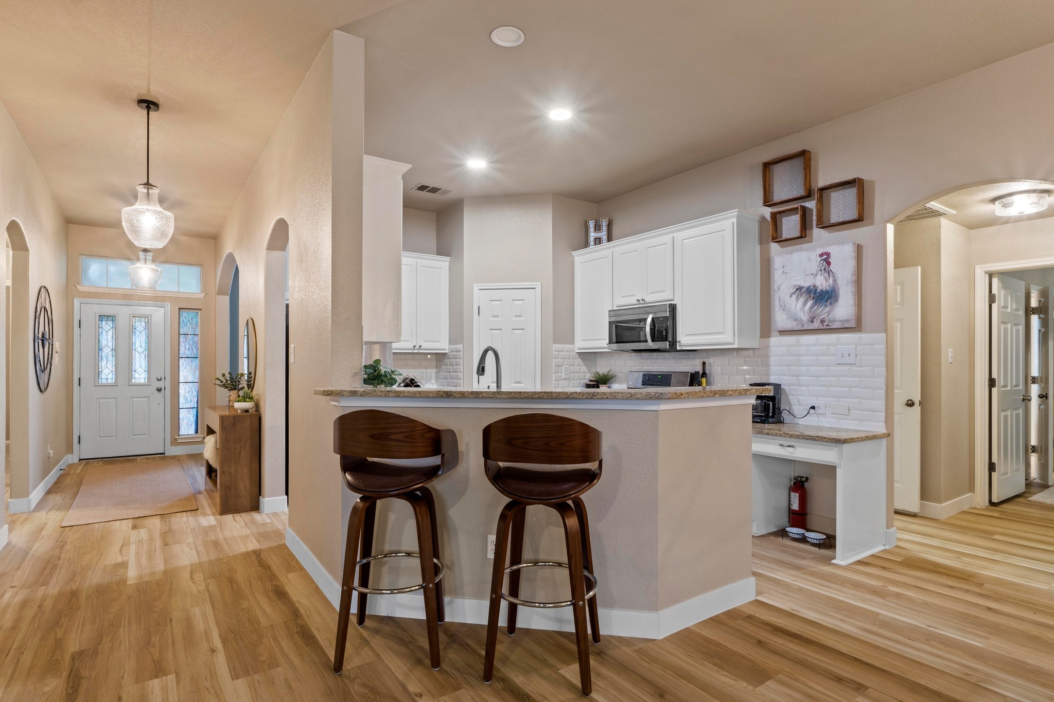 1020 Portchester Castle Path Pflugerville, TX 78660 - Photo 12 of 29 A sizeable bar overlooks the bright kitchen and provides additional space for enjoying a meal and/or beverage.