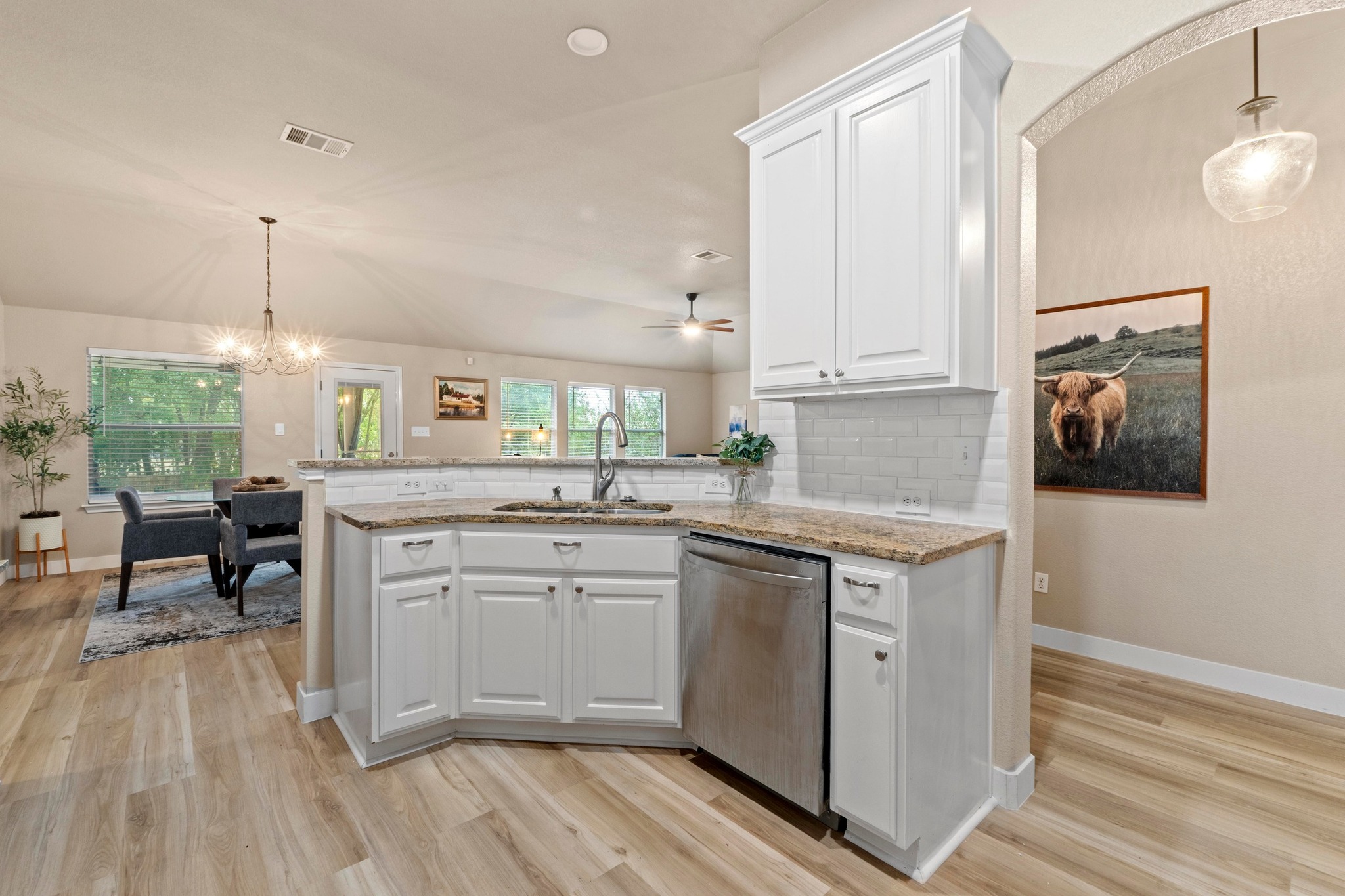 1020 Portchester Castle Path Pflugerville, TX 78660 - Photo 15 of 29 The kitchen is open to the charming dining area, making meal transfer as easy as ever.