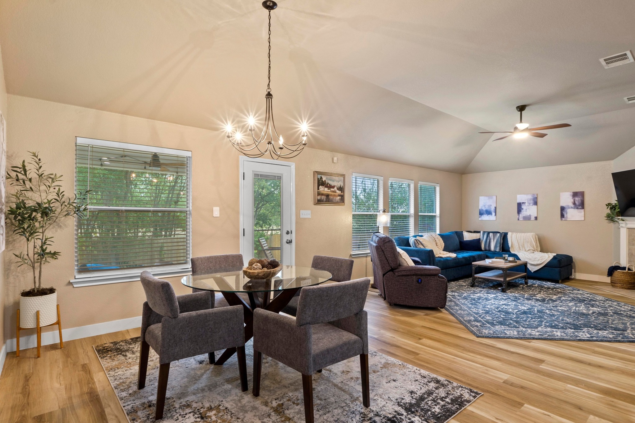 1020 Portchester Castle Path Pflugerville, TX 78660 - Photo 16 of 29 The dining area includes a graceful overhead light fixture and direct access to the backyard.