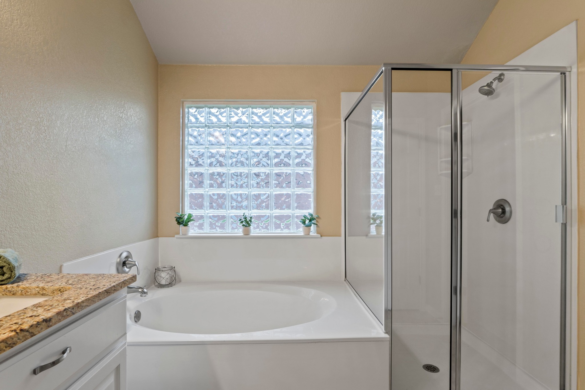 1020 Portchester Castle Path Pflugerville, TX 78660 - Photo 19 of 29 Enjoy some much needed relaxation in the deep soaking tub or in the comfortable walk-in shower after a long day.