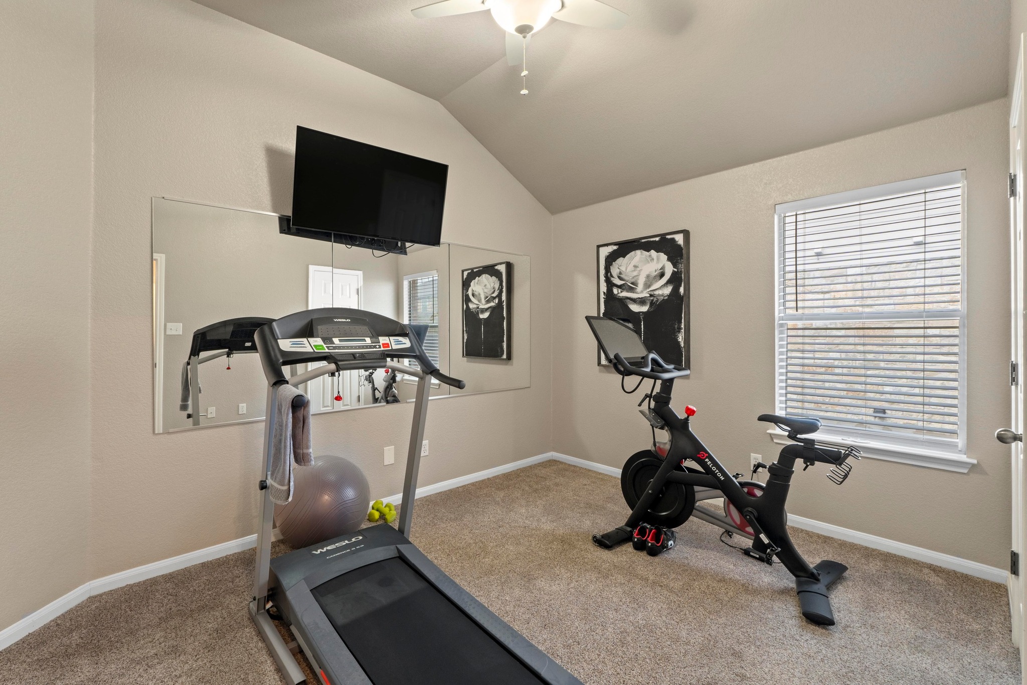 1020 Portchester Castle Path Pflugerville, TX 78660 - Photo 21 of 29 This bedroom includes a high ceiling, a ceiling fan, and a walk-in closet.