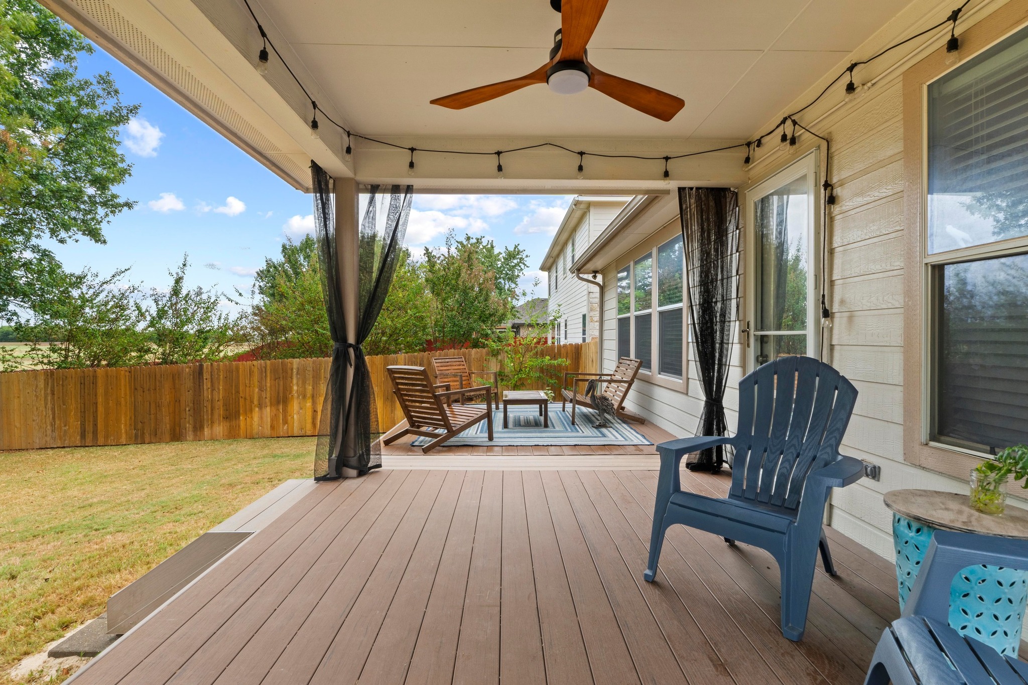1020 Portchester Castle Path Pflugerville, TX 78660 - Photo 26 of 29 The covered patio includes a ceiling fan which comes in handy during the warmer months.