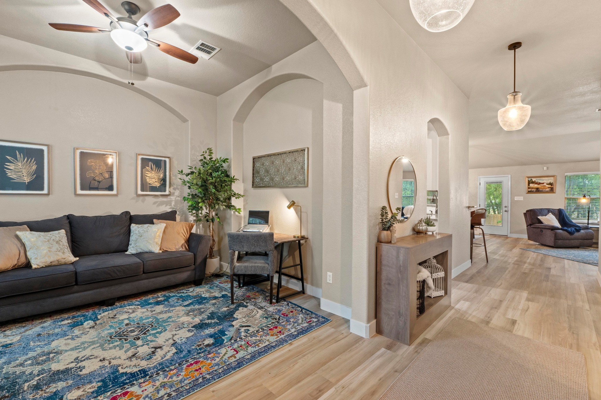 1020 Portchester Castle Path Pflugerville, TX 78660 - Photo 9 of 29 The wide entryway has sleek vinyl plank flooring and guides you down to the common areas.