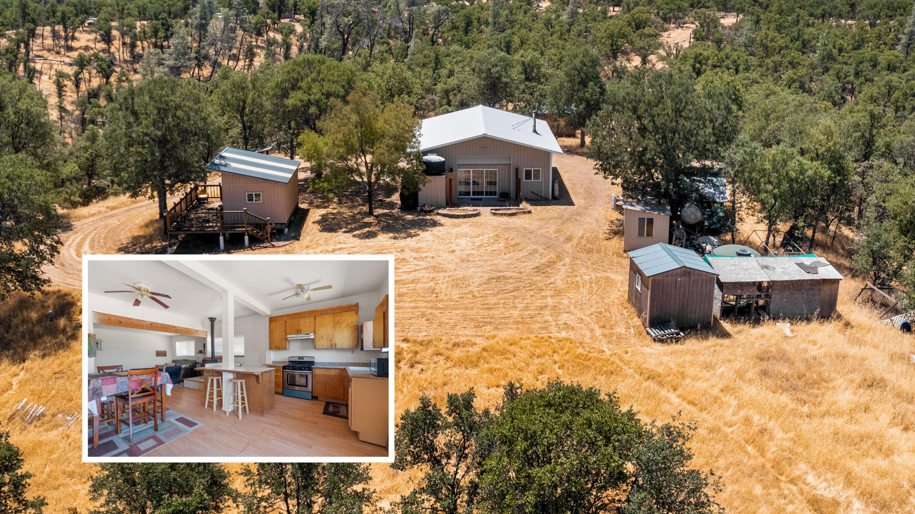 16720 Blue Oak Road Cottonwood, CA 96022 - Photo 1 of 35 a aerial view of a house with large trees and furniture