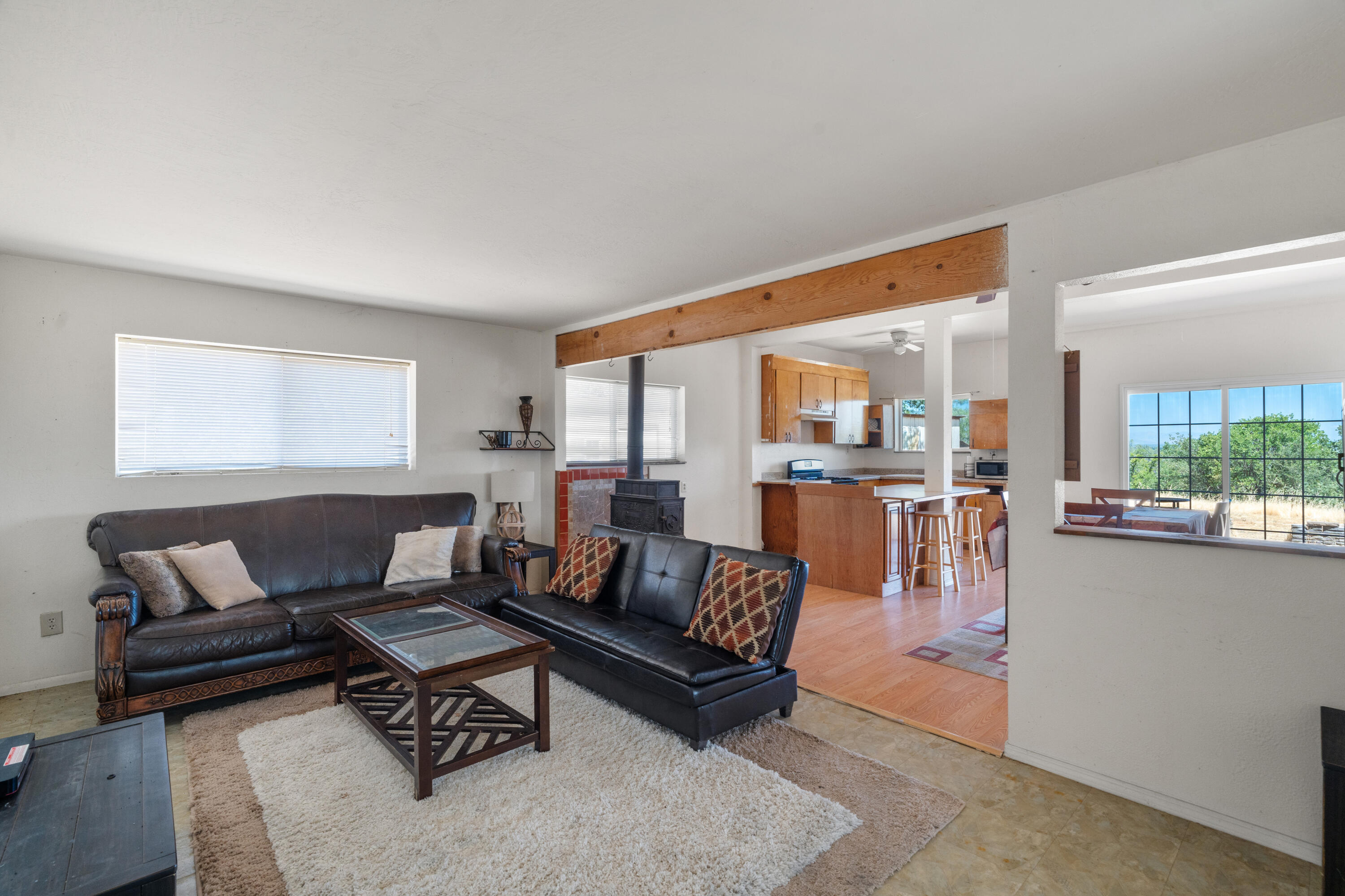 16720 Blue Oak Road Cottonwood, CA 96022 - Photo 13 of 35 a living room with furniture and a large window