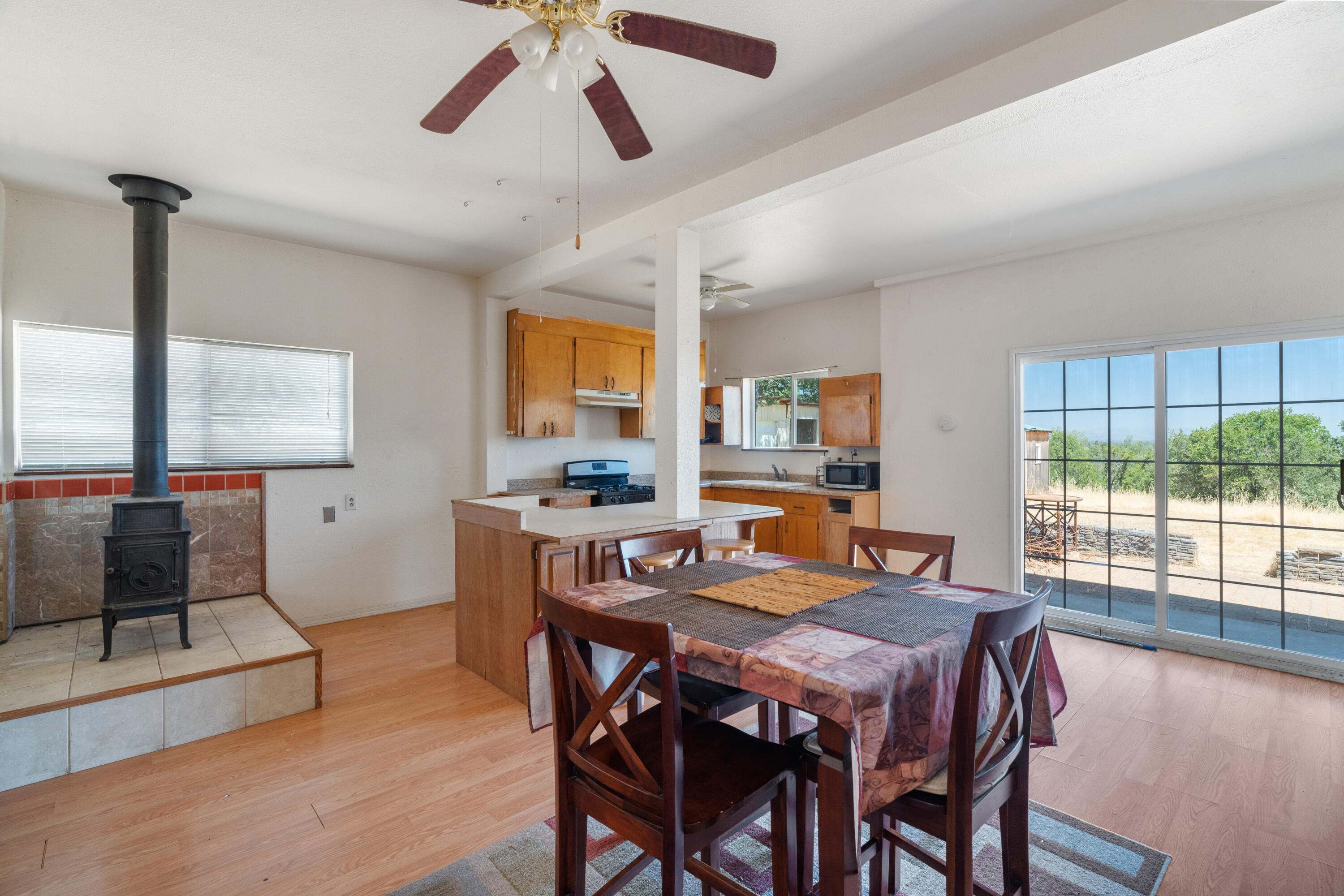 16720 Blue Oak Road Cottonwood, CA 96022 - Photo 2 of 35 a dining room with furniture window and wooden floor