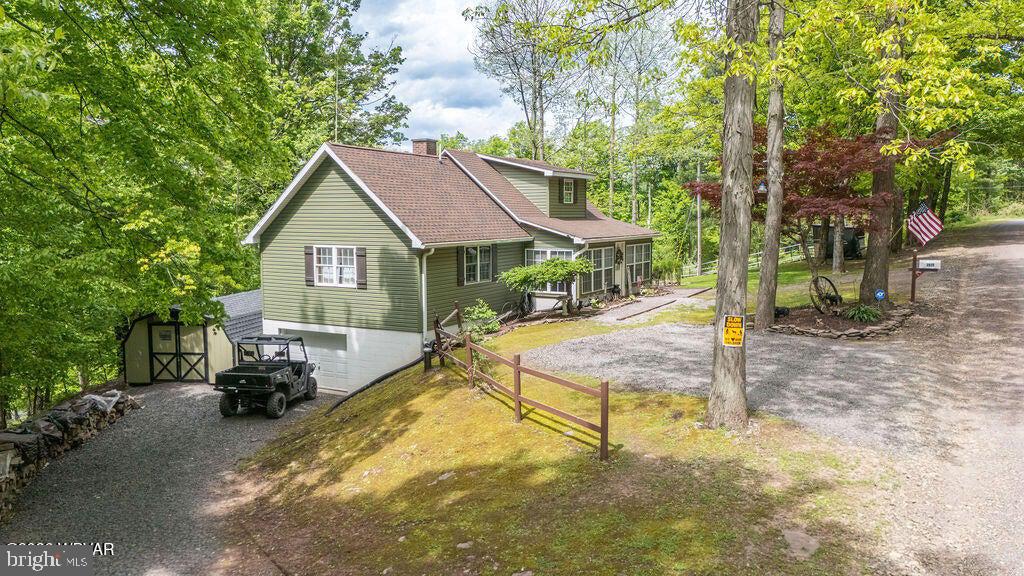 2025 Whiskey Run Road Muncy Valley, PA 17758 - Photo 10 of 54 Charming home nestled in lush greenery.