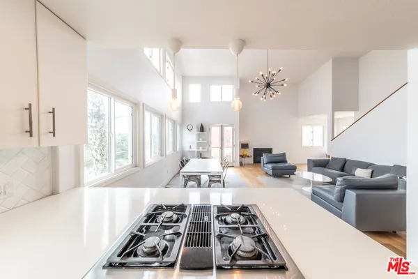 a kitchen with a sink and a window