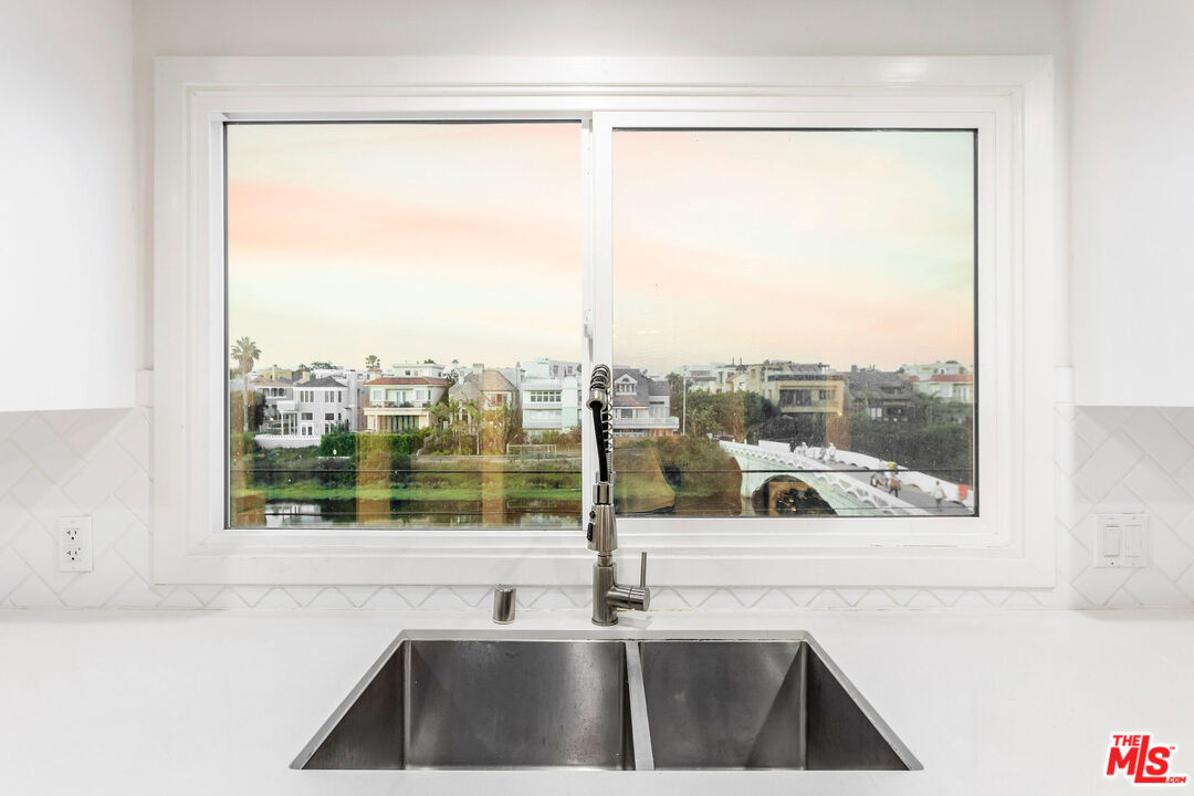 29 Lighthouse Street, Unit 3PH Venice, CA 90292 - Photo 6 of 25 a kitchen with a sink and a window