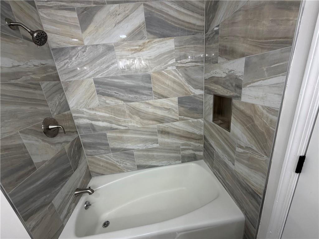 3763 Elkridge Drive Decatur, GA 30032 - Photo 5 of 20 a bathroom with a tub