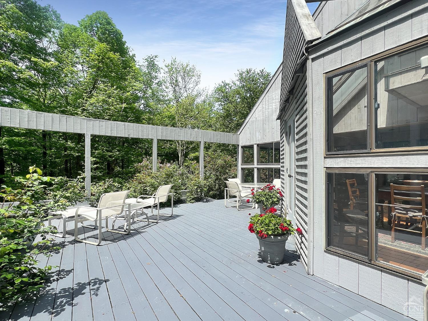 208 Cambridge Road Copake, NY 12529 - Photo 11 of 36 a view of a house with sitting area and garden view