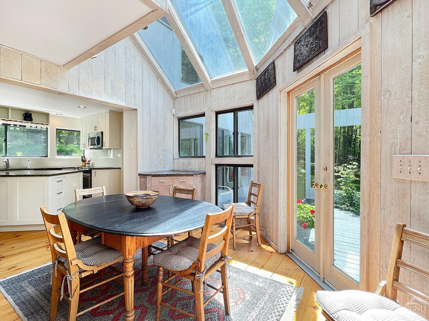 208 Cambridge Road Copake, NY 12529 - Photo 16 of 36 a view of a dining room with furniture window and wooden floor