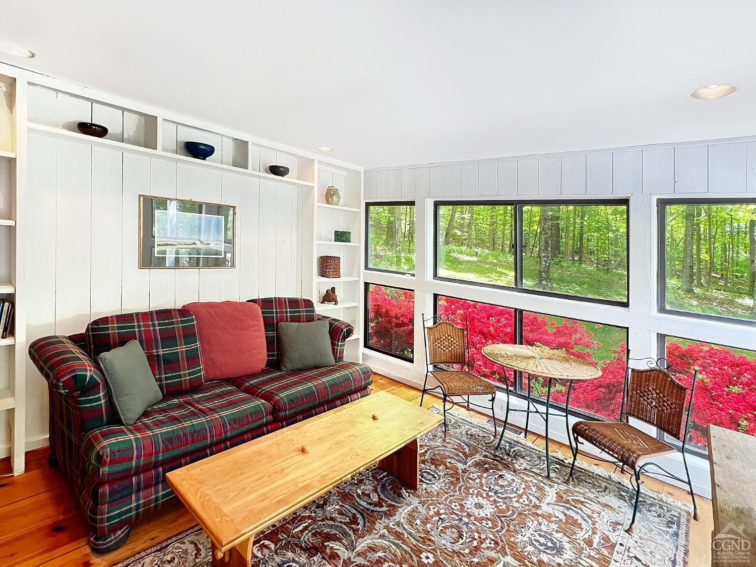208 Cambridge Road Copake, NY 12529 - Photo 23 of 36 a living room with furniture and a large window