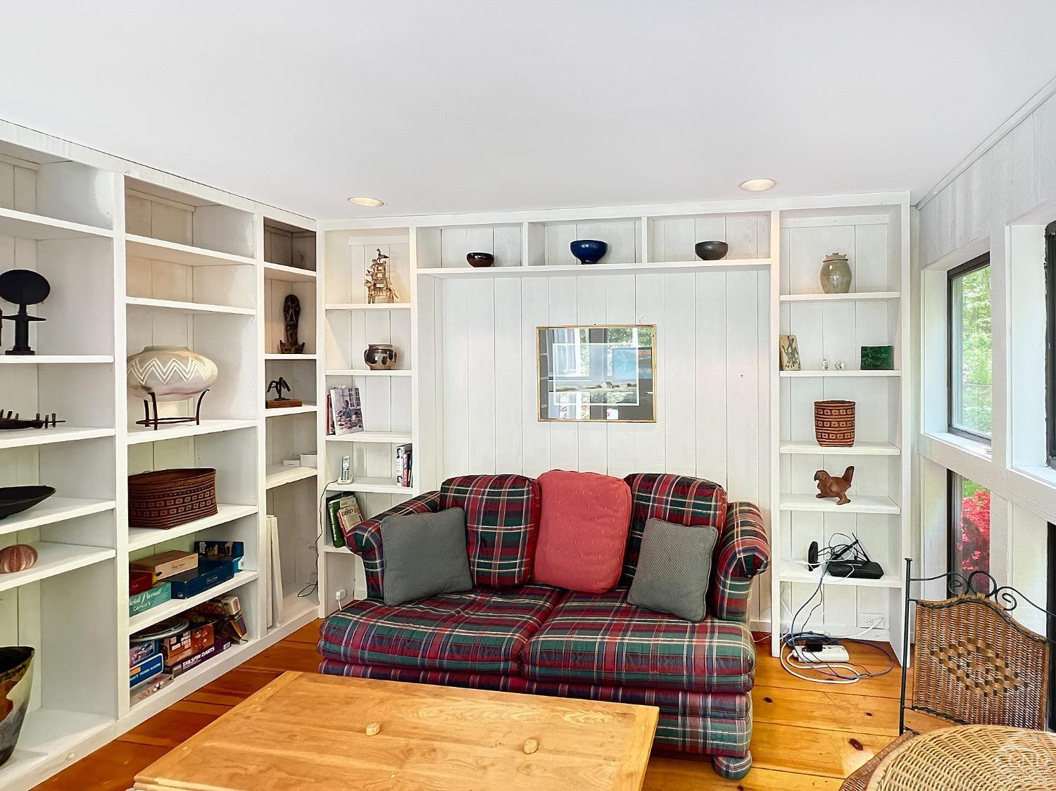 208 Cambridge Road Copake, NY 12529 - Photo 24 of 36 a living room with furniture cabinets and window